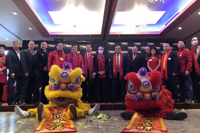 A photo of community and city leaders during a Lunar New Year event that turned into an anti-shelter fundraiser